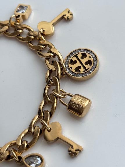 PULSERA CON DIJES TORY