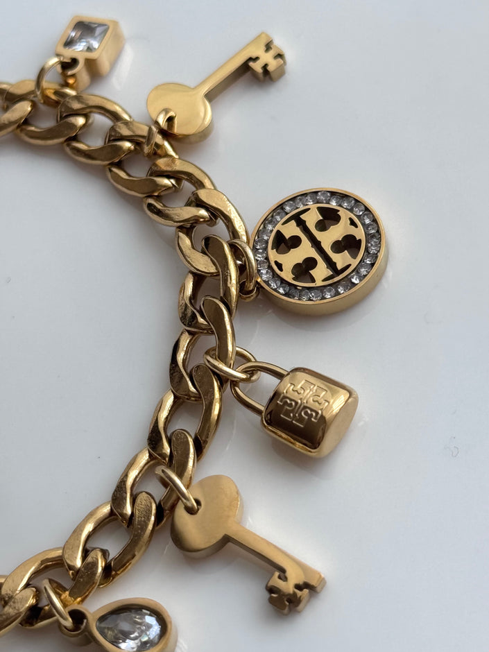 PULSERA CON DIJES TORY
