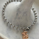 PULSERA BOLITAS CON OSITO