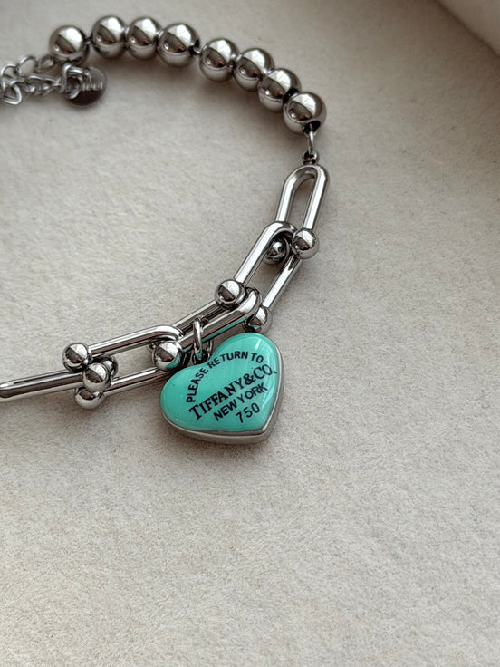 PULSERA ESLABONES CORAZON AZUL
