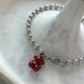 PULSERA BOLITAS CON OSITO