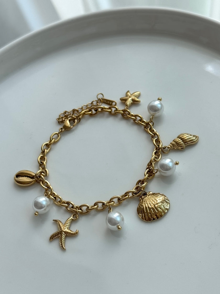 PULSERA DIJES CONCHAS Y PERLAS