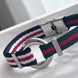 PULSERA TELA PLACA REDONDA GG