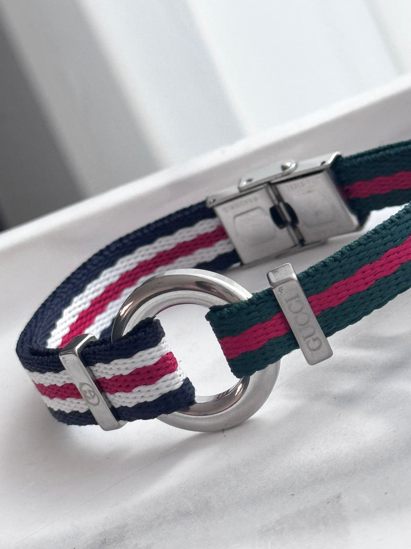 PULSERA TELA PLACA REDONDA GG