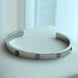 PULSERA ABIERTA CON ZIRCONIAS DE COLORES