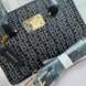 BOLSA BEBE CLUTCH NEGRA