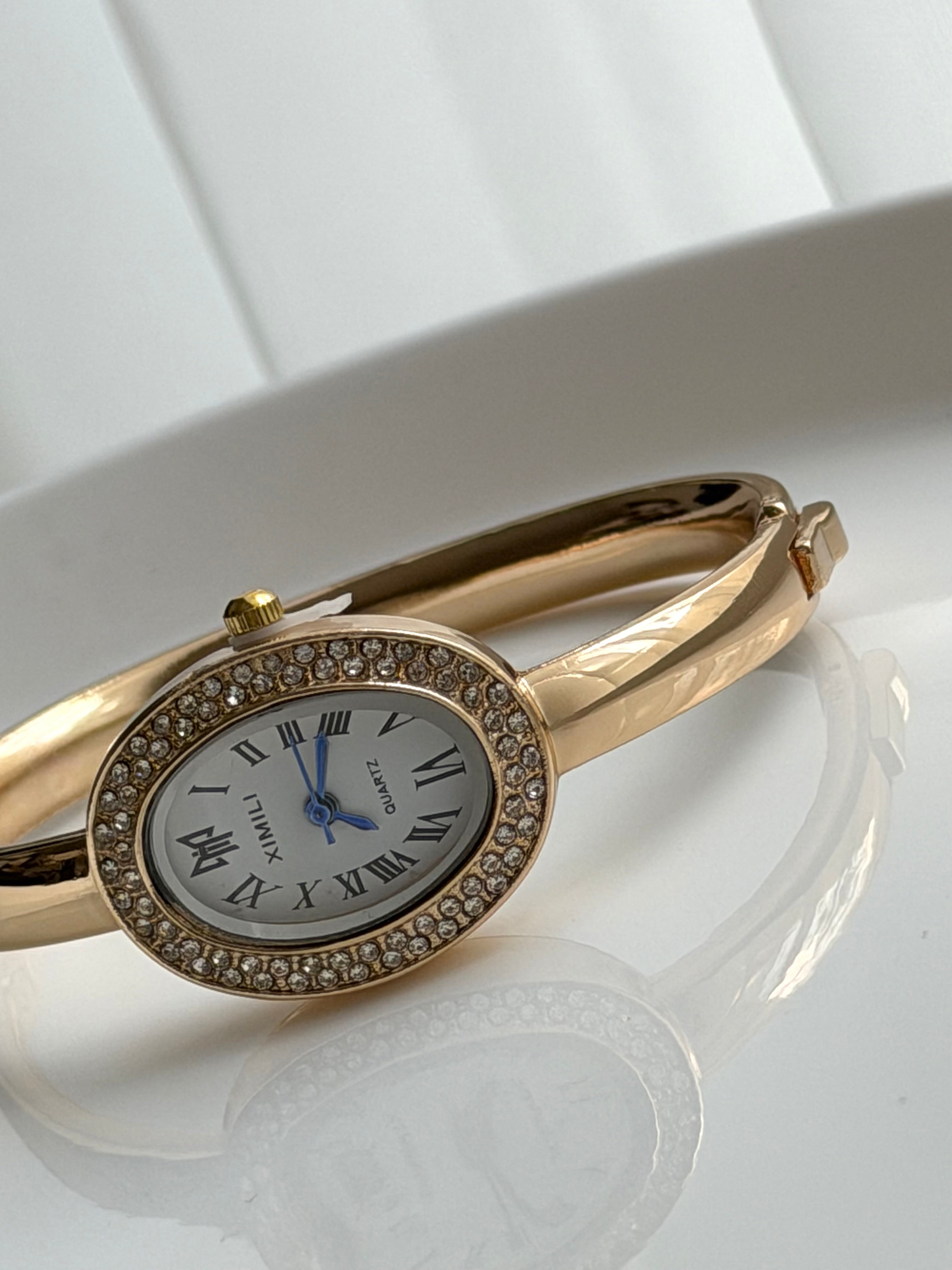 RELOJ TIPO PULSERA CON CRISTAL