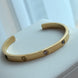 PULSERA ABIERTA CON ZIRCONIAS DE COLORES