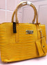 BOLSA BEBE AUBREY CROCO AMARILLA