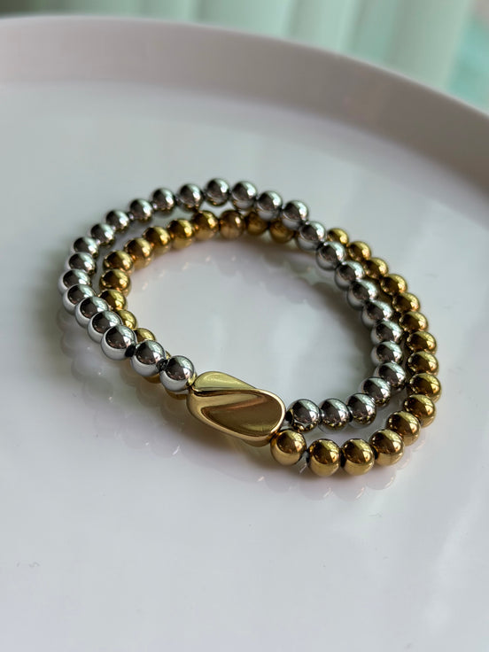 PULSERA BOLITAS DIJE IRREGULAR