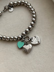 PULSERA BOLITAS CON DIJES