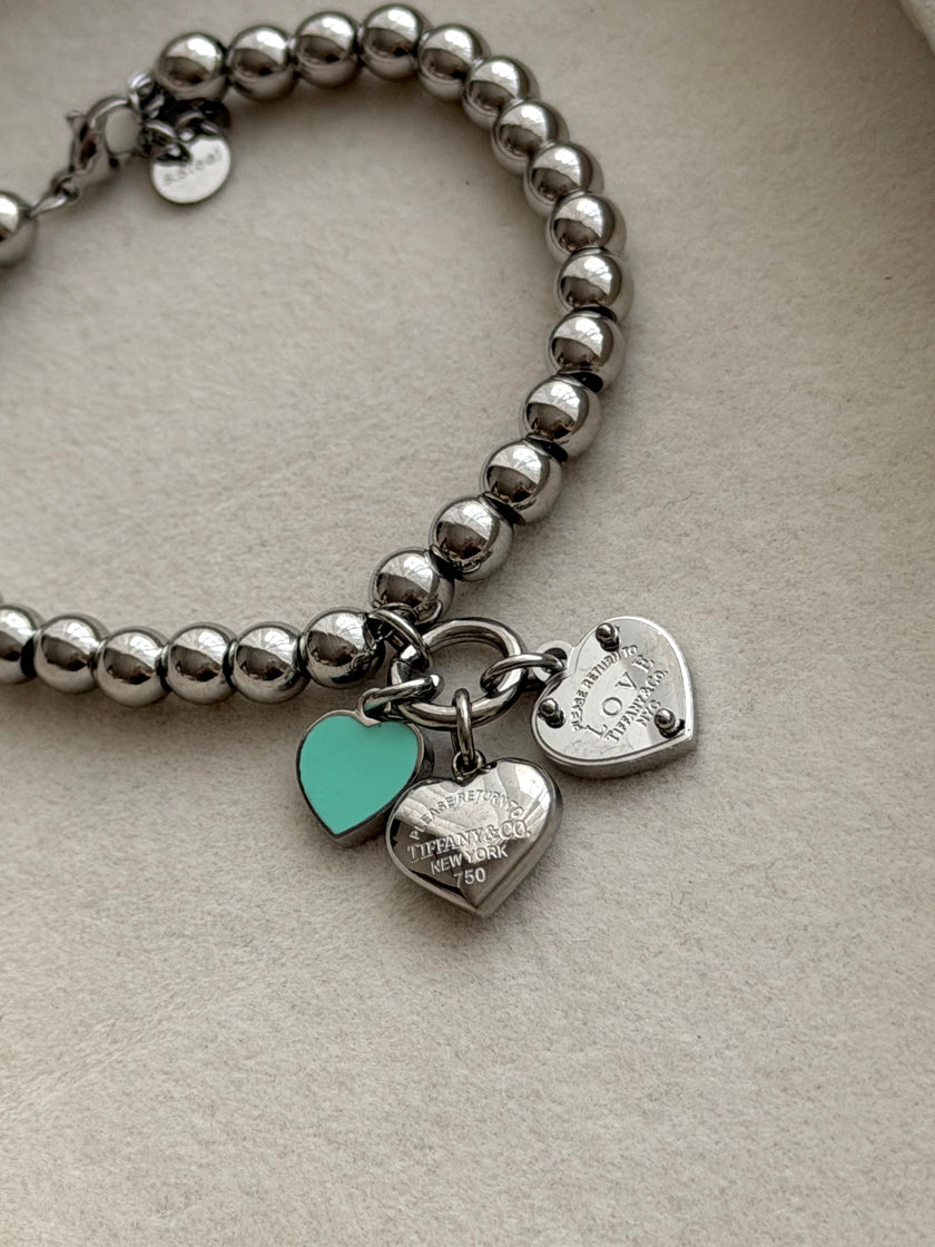 PULSERA BOLITAS CON DIJES