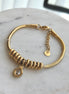 PULSERA CON  CHARMS