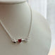 COLLAR FLECHA ROJO