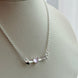 COLLAR FLECHA ROSA