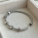 PULSERA ECROU
