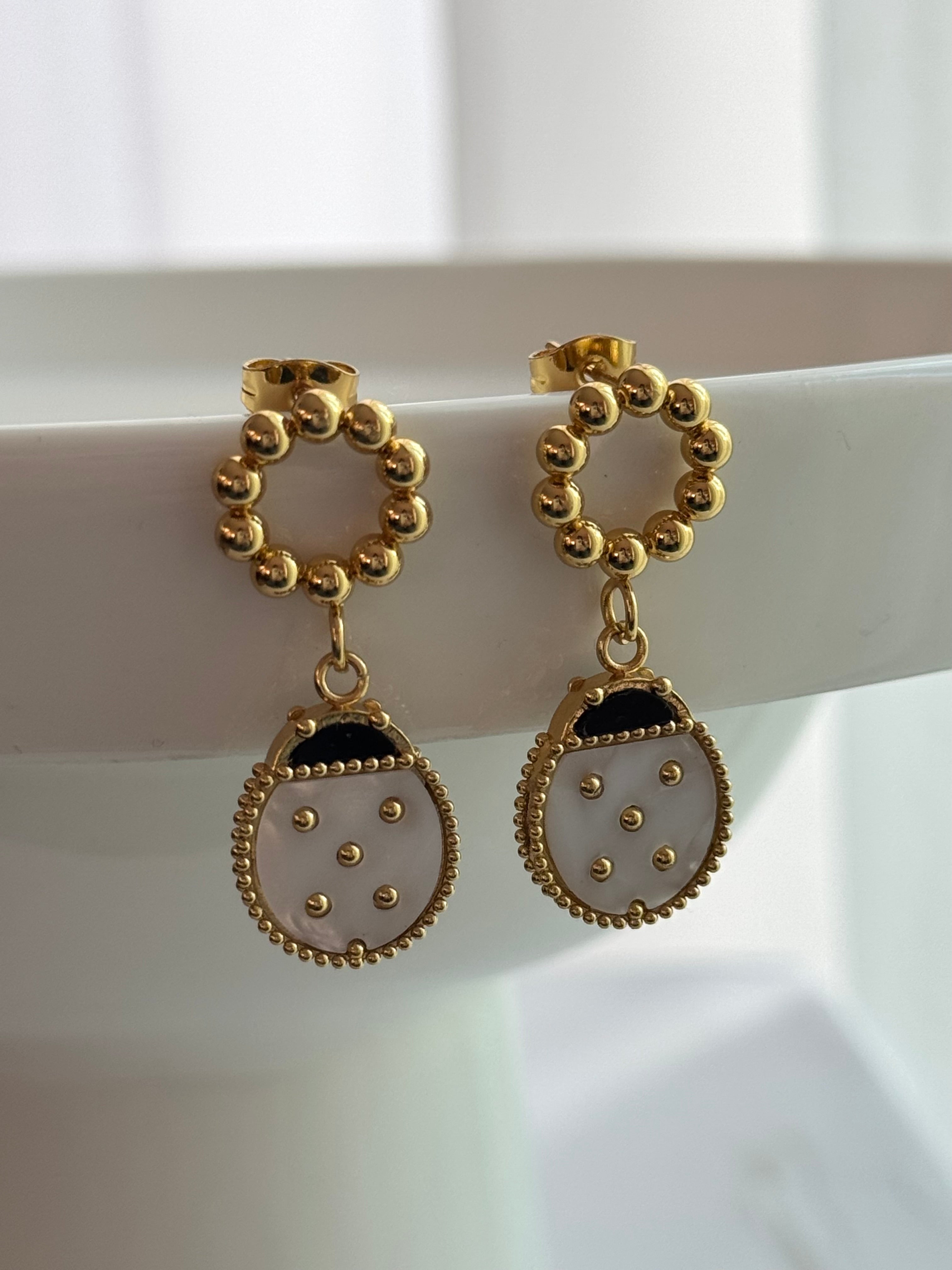 ARETE MARIQUITA ALAS CERRADAS BLANCO