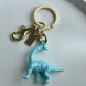 LLAVERO DINOSAURIO AZUL