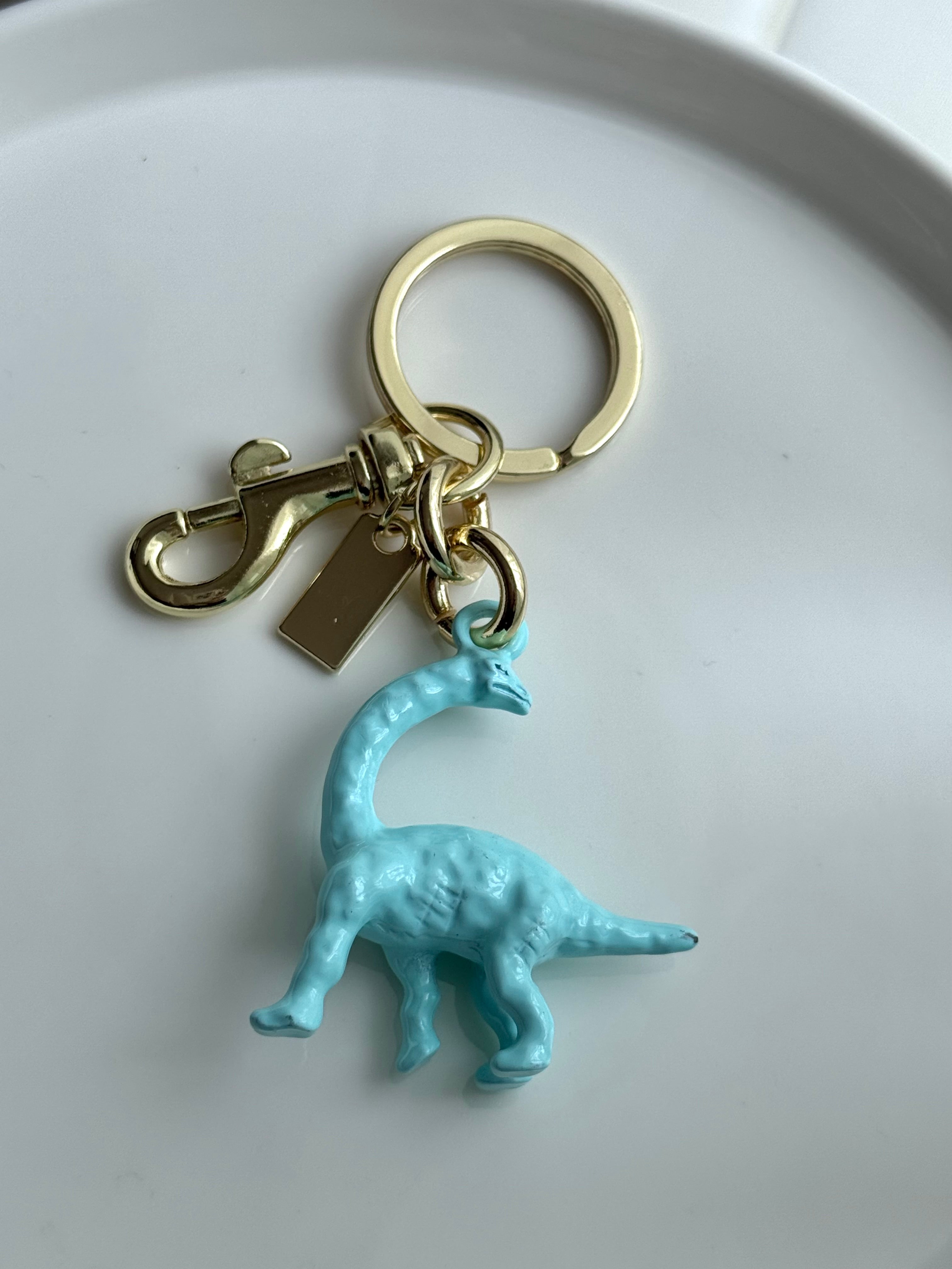 LLAVERO DINOSAURIO AZUL