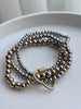PULSERA BOLITAS HEBILLA CORAZON