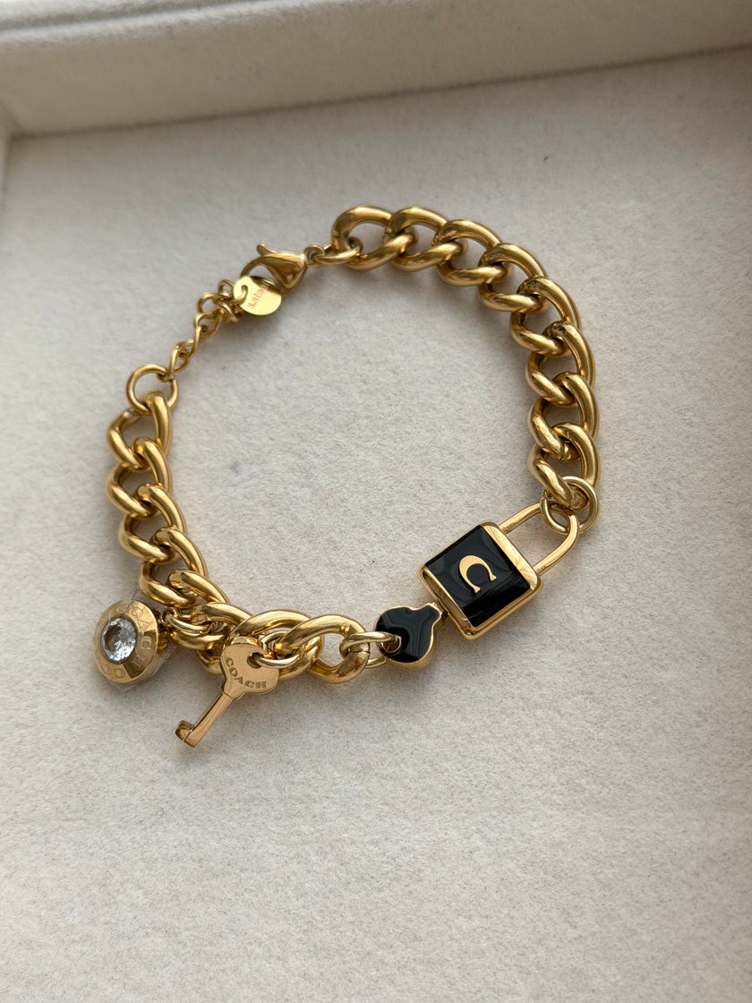 PULSERA LLAVE CADADO NEGRO