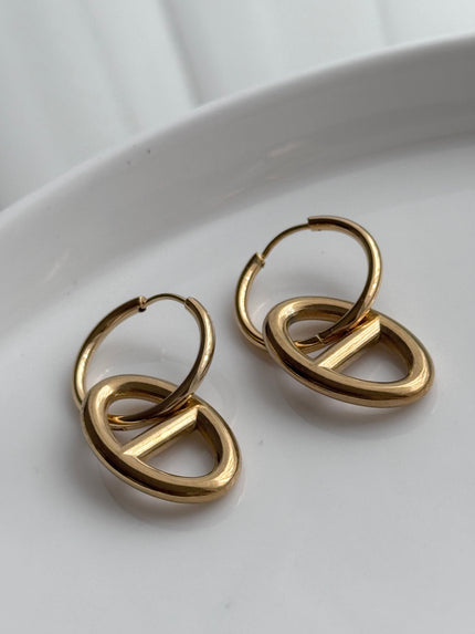 ARRACADA CON DIJE OVALO