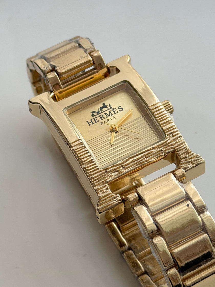 RELOJ H