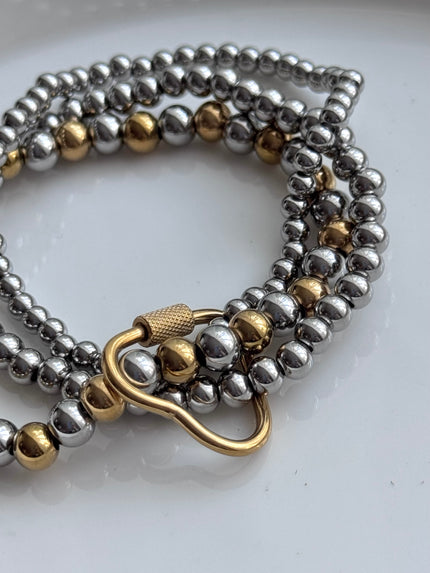 PULSERA BOLITAS HEBILLA CORAZON