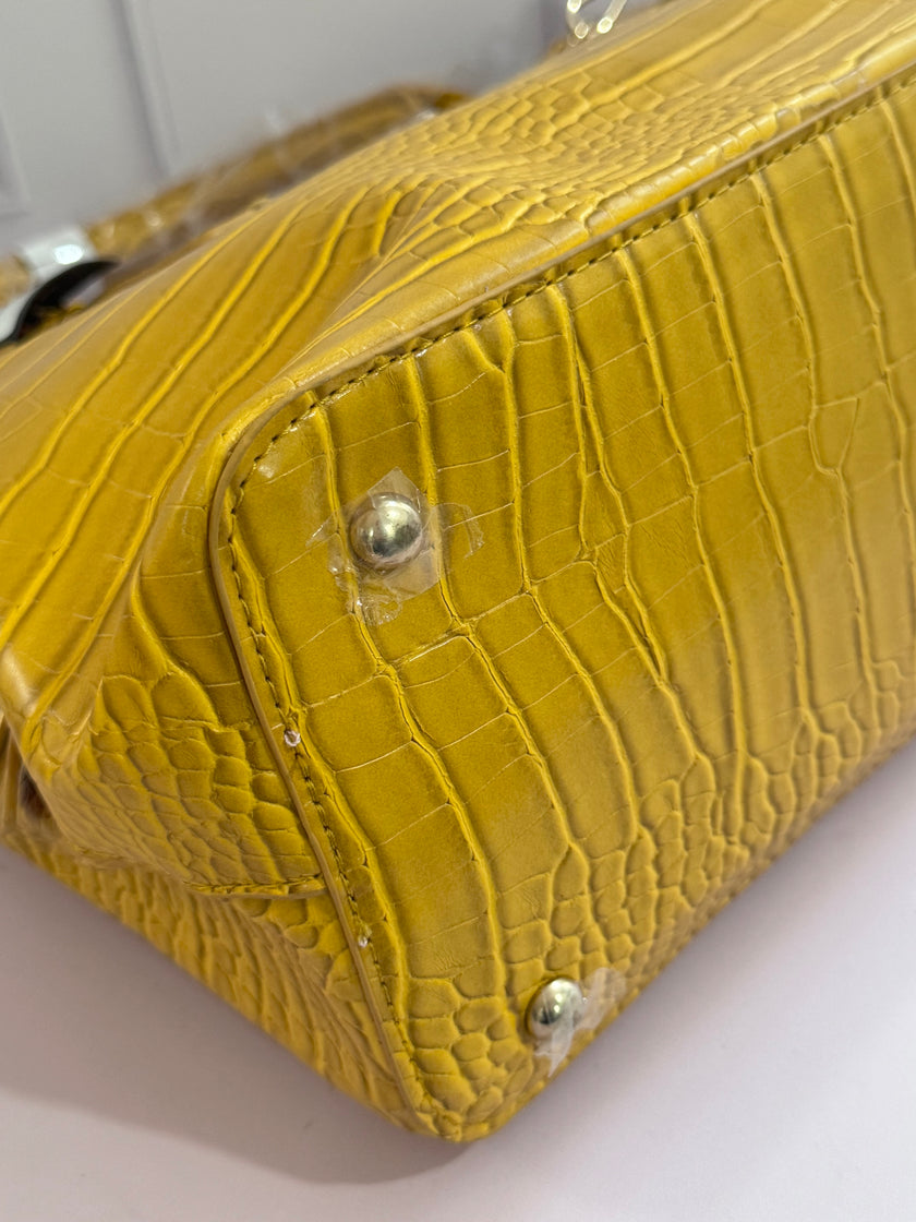 BOLSA BEBE AUBREY CROCO AMARILLA