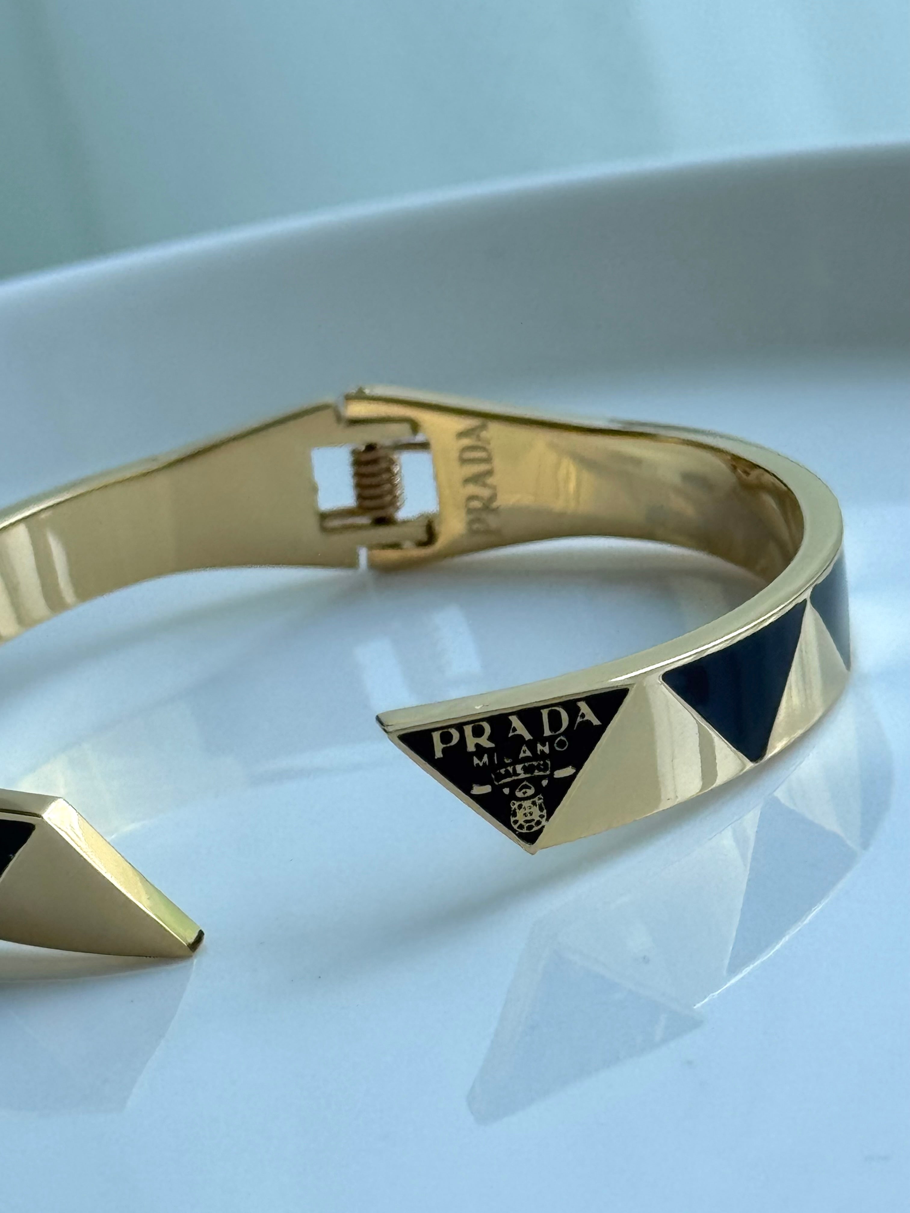 BRAZALETE ABIERTO PRADA
