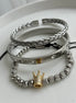 TRÍO DE PULSERAS CORONA DORADA
