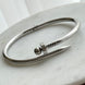 BRAZALETE CLAVO CON BOLITA LISA