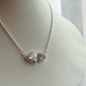 COLLAR DOBLE CORAZON ROSA