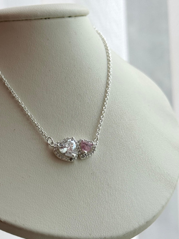 COLLAR DOBLE CORAZON ROSA