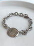 PULSERA TFNY PLACA OVALADA
