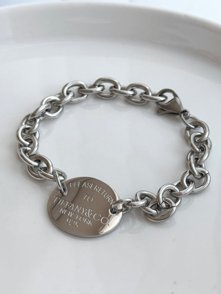 PULSERA TFNY PLACA OVALADA