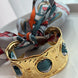 BRAZALETE CON MASCADA GRIS