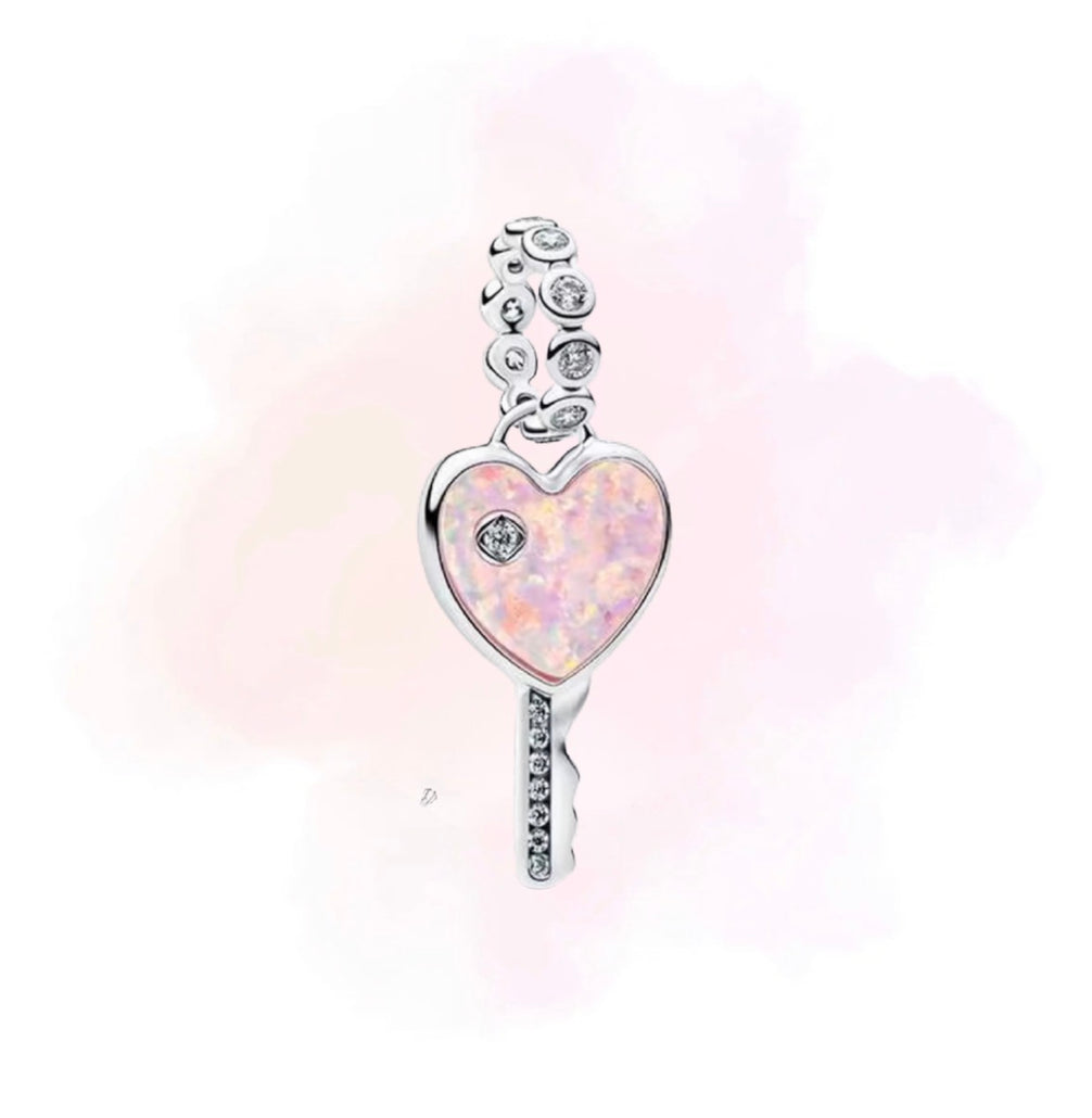 CHARM LLAVE ROSA