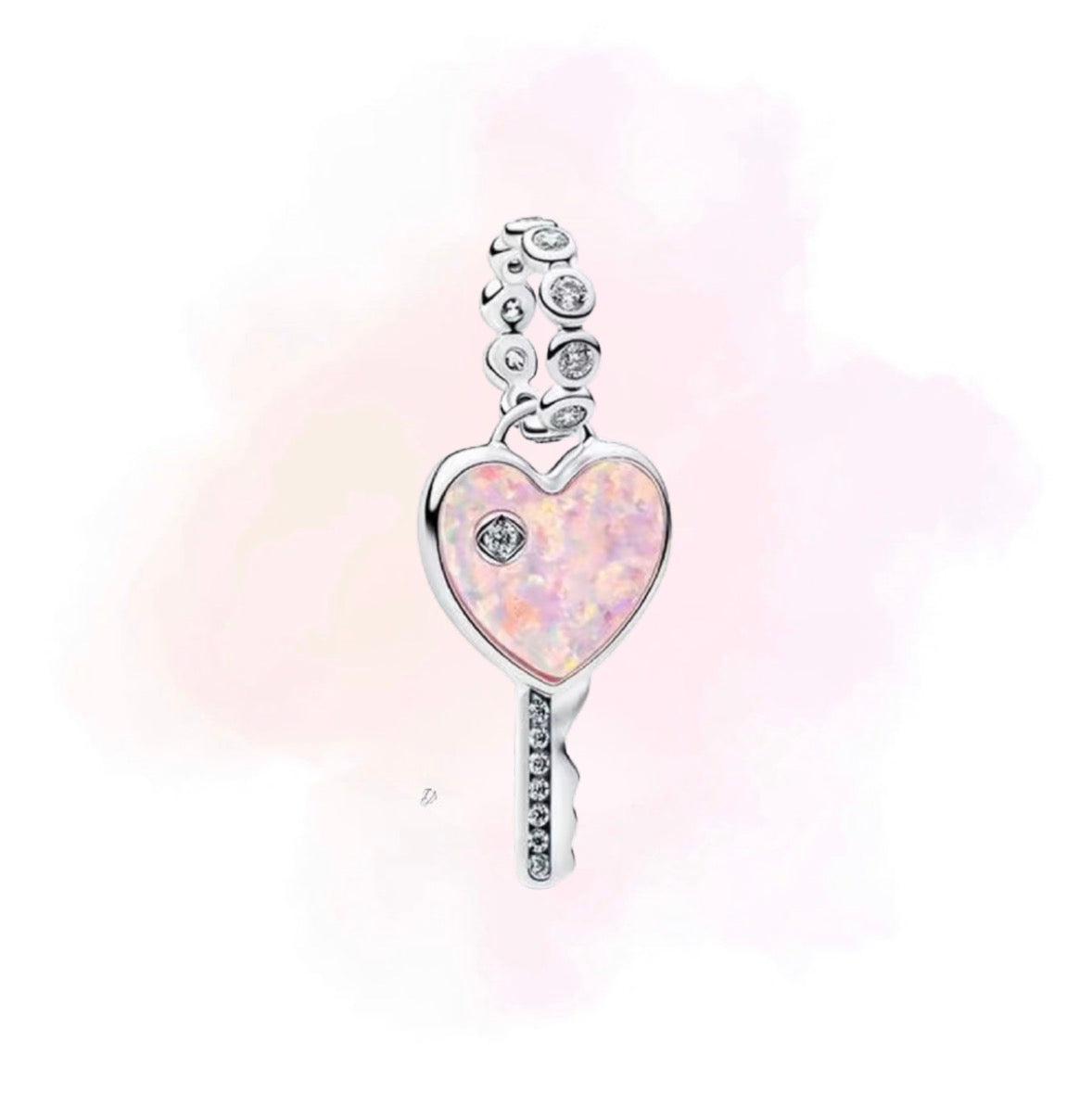 CHARM LLAVE ROSA