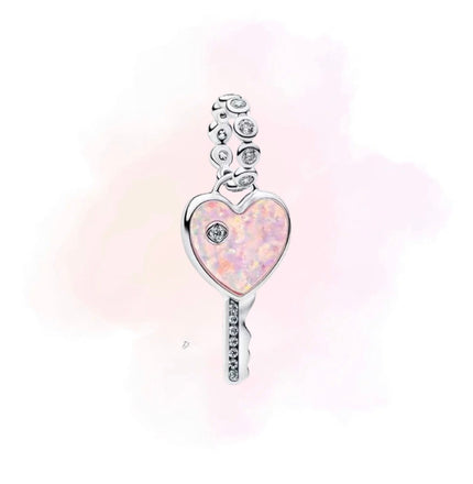 CHARM LLAVE ROSA