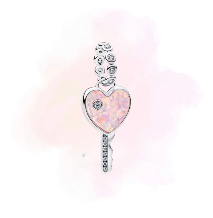 CHARM LLAVE ROSA