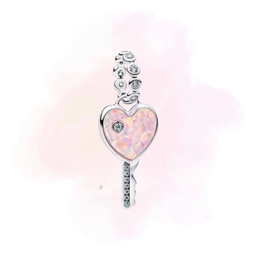 CHARM LLAVE ROSA