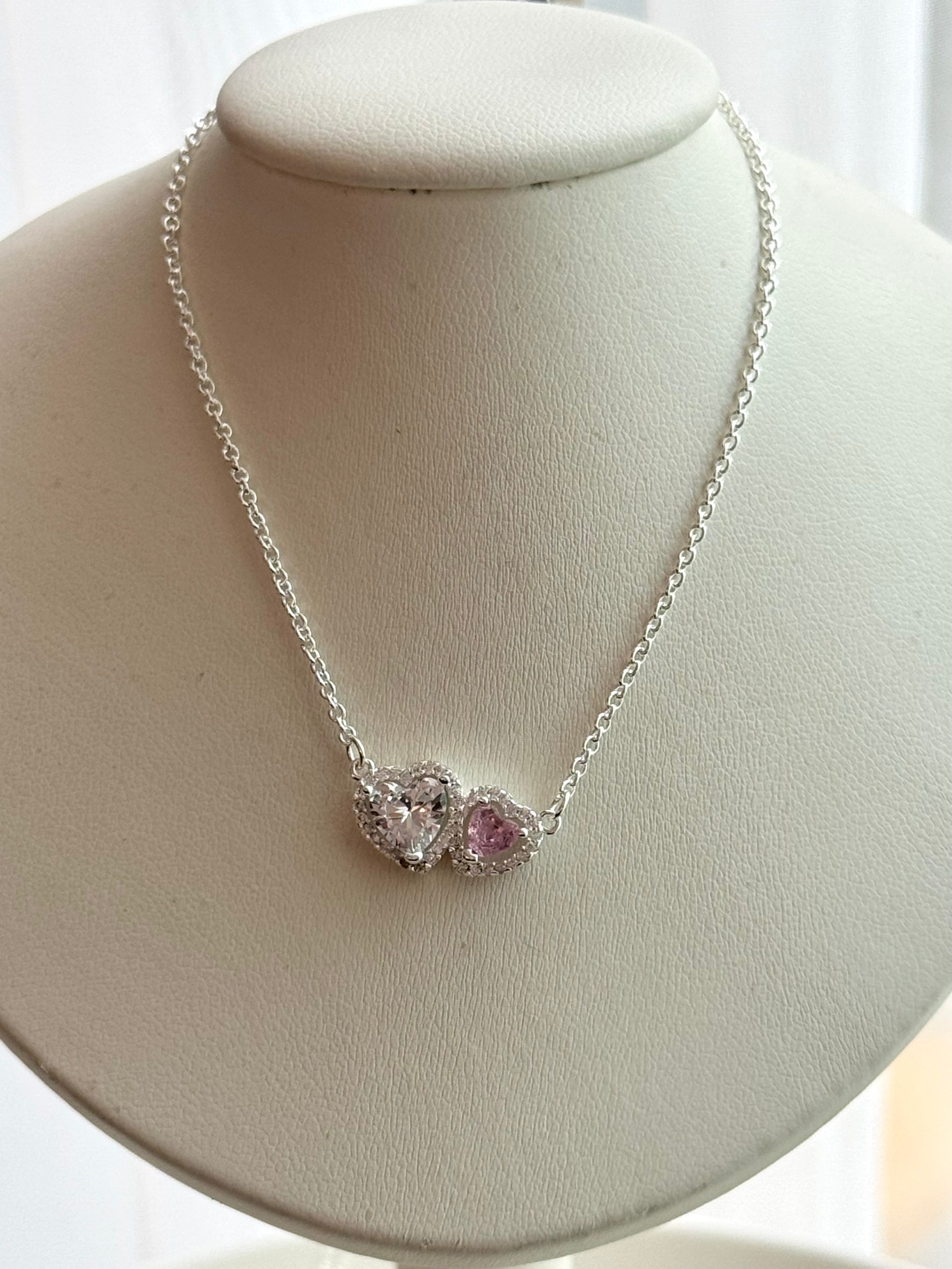 COLLAR DOBLE CORAZON ROSA