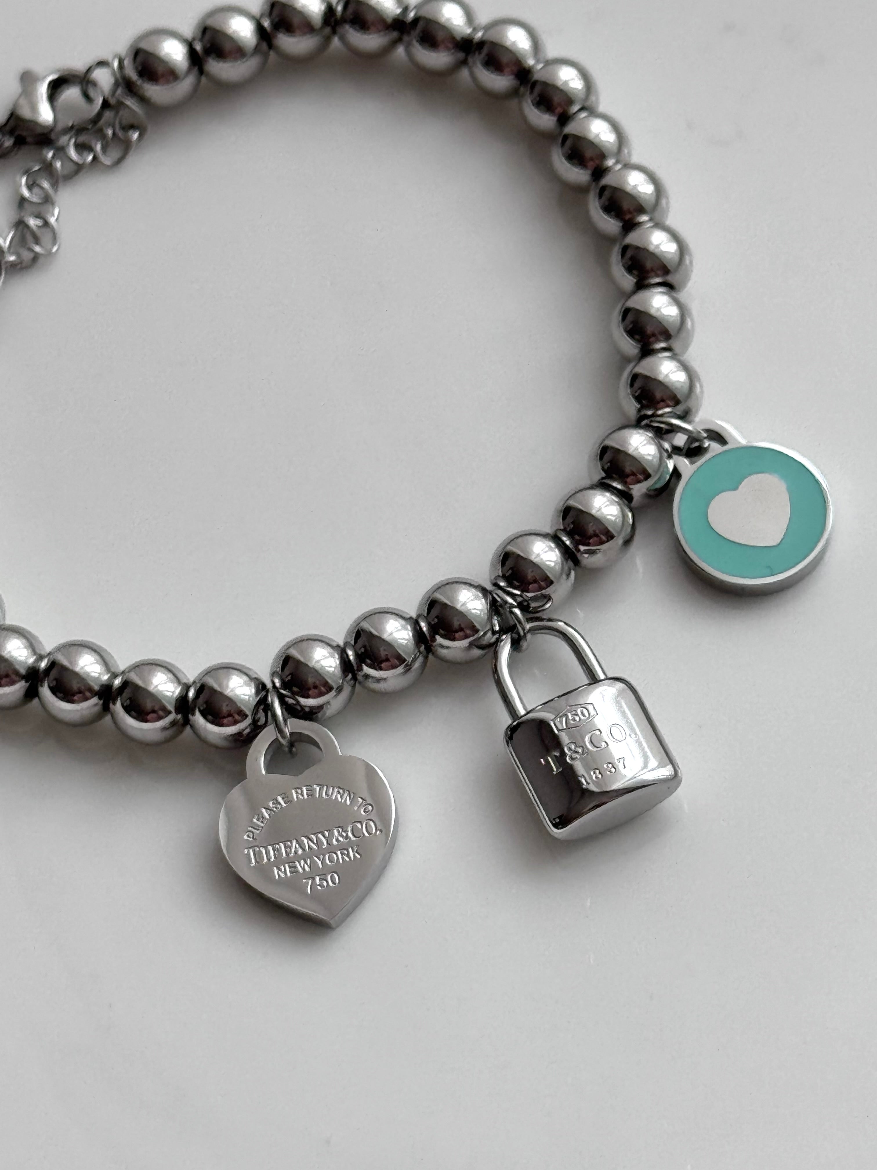 PULSERA BOLITAS CON DIJES