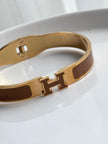 BRAZALETE H DORADO