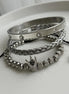 TRÍO PULSERAS CORONA PLATEADA