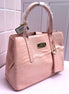 BOLSA BEBE AUBREY CROCO ROSA
