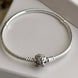 PULSERA FLEXIBLE CAMPANITA