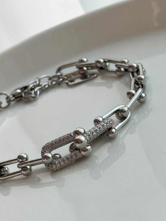 PULSERA ESLABONES CON CRISTAL PLATEADO