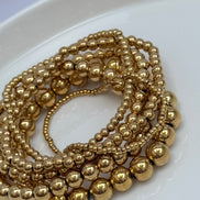 SET DE PULSERAS BOLITAS